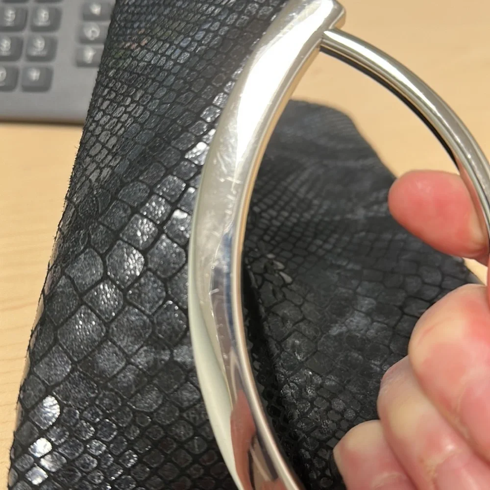 Bebe faux snake skin clutch with silver hardware